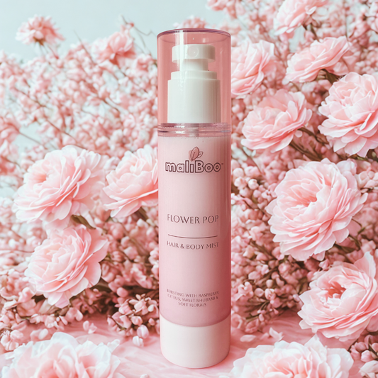 Maliboo Flower Pop Hair and Body Mist bottle with floral accents and pastel tones. Vegan, cruelty-free mist with fresh, playful floral scent